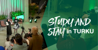 Event hosts and audience in auditorium with overcast text saying Study and Stay in Turku